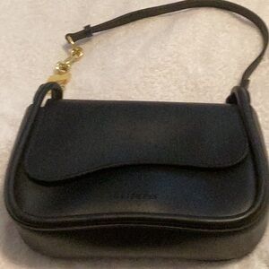 Small Black bag with gold chain. Faux Leather